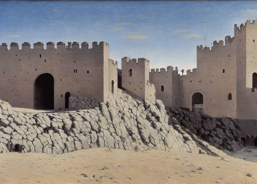 Medieval fortress with high walls and towers on rocky terrain