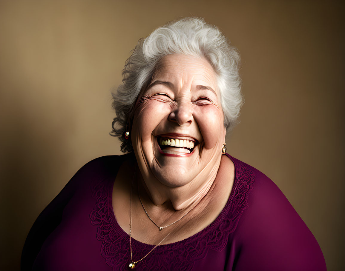 Elderly woman with white hair laughing in purple blouse