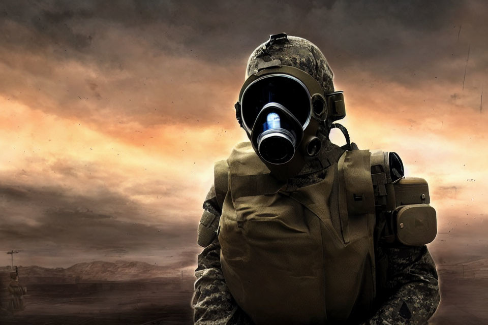 Soldier in combat gear with gas mask on smoky battlefield.