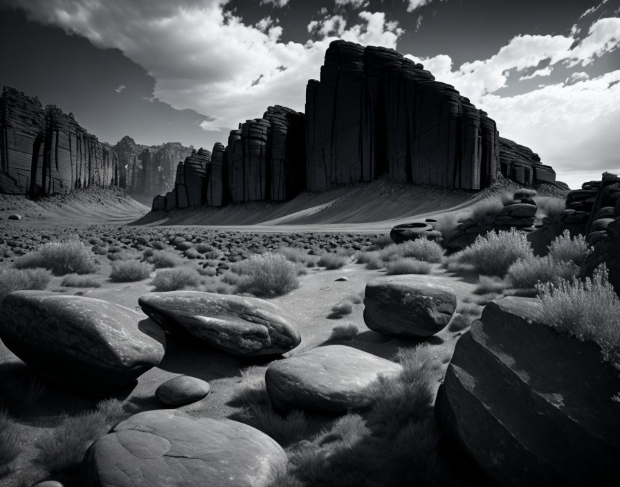 Monochrome desert landscape with towering rock formations