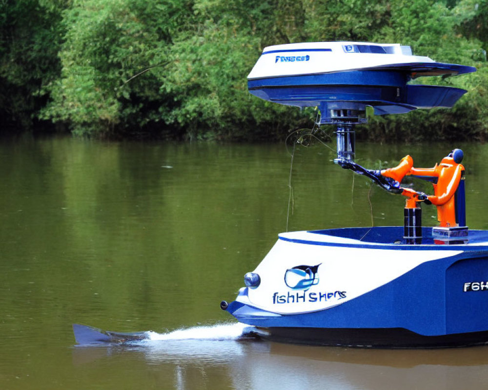 Robotic boat with FishSharks branding on calm river with mechanical arm & water monitoring.