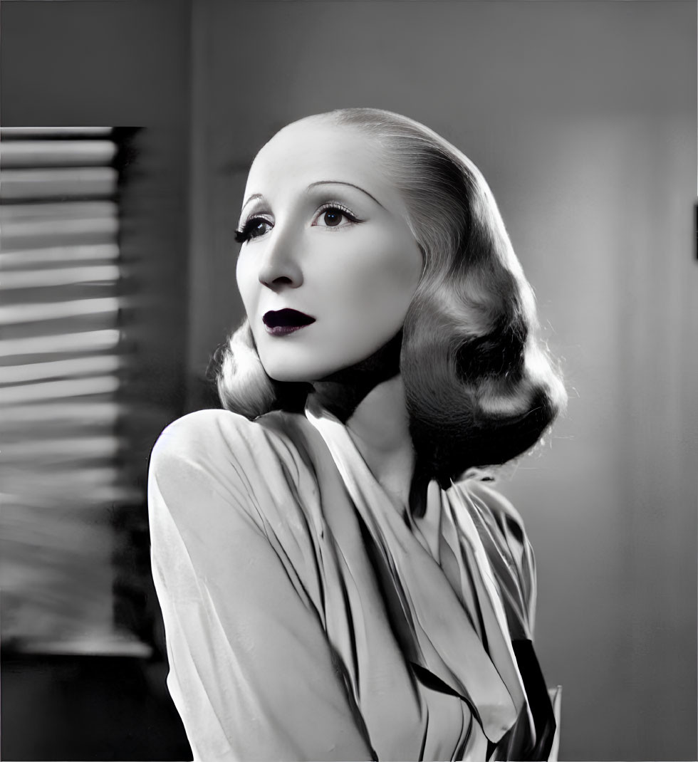 Vintage-style black and white portrait of a woman with elegant dress and makeup