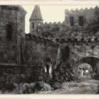 Ancient ruins with crumbling stone walls and arches in monochrome.