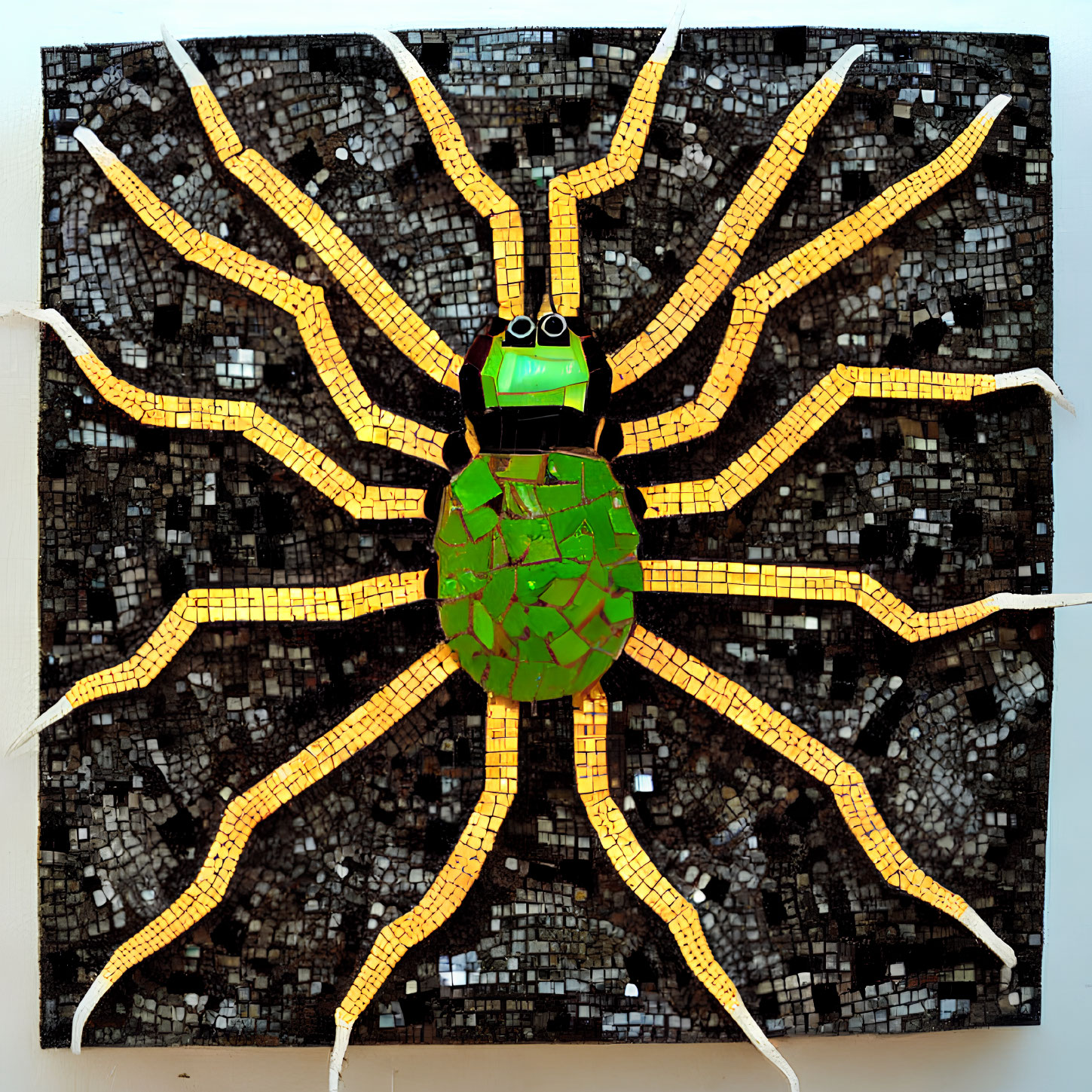 Green and Gold Spider Mosaic on Textured Brown Background