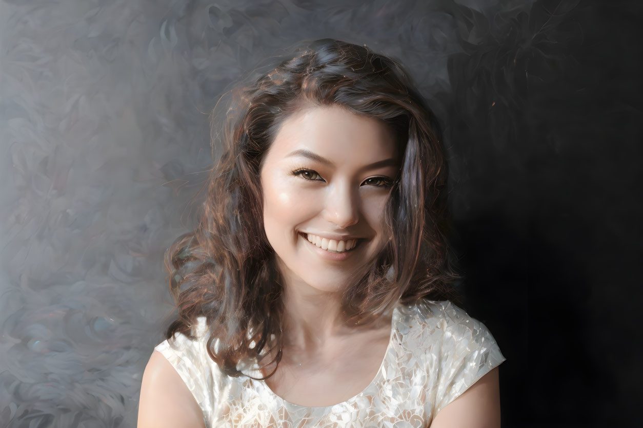 Smiling woman with curly hair on blurred background