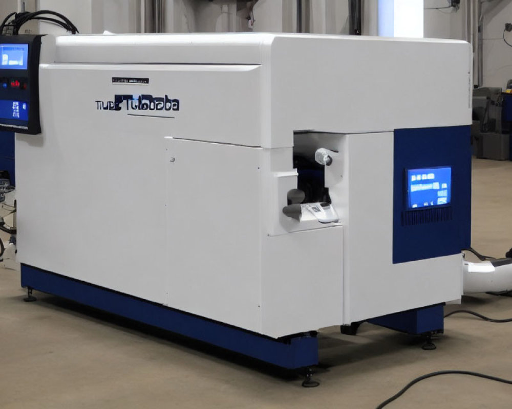 White and Blue Industrial CNC Machine with Digital Display and Robotic Arm