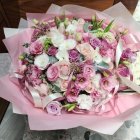 Delicate pink and white flower bouquet with sparkle accents