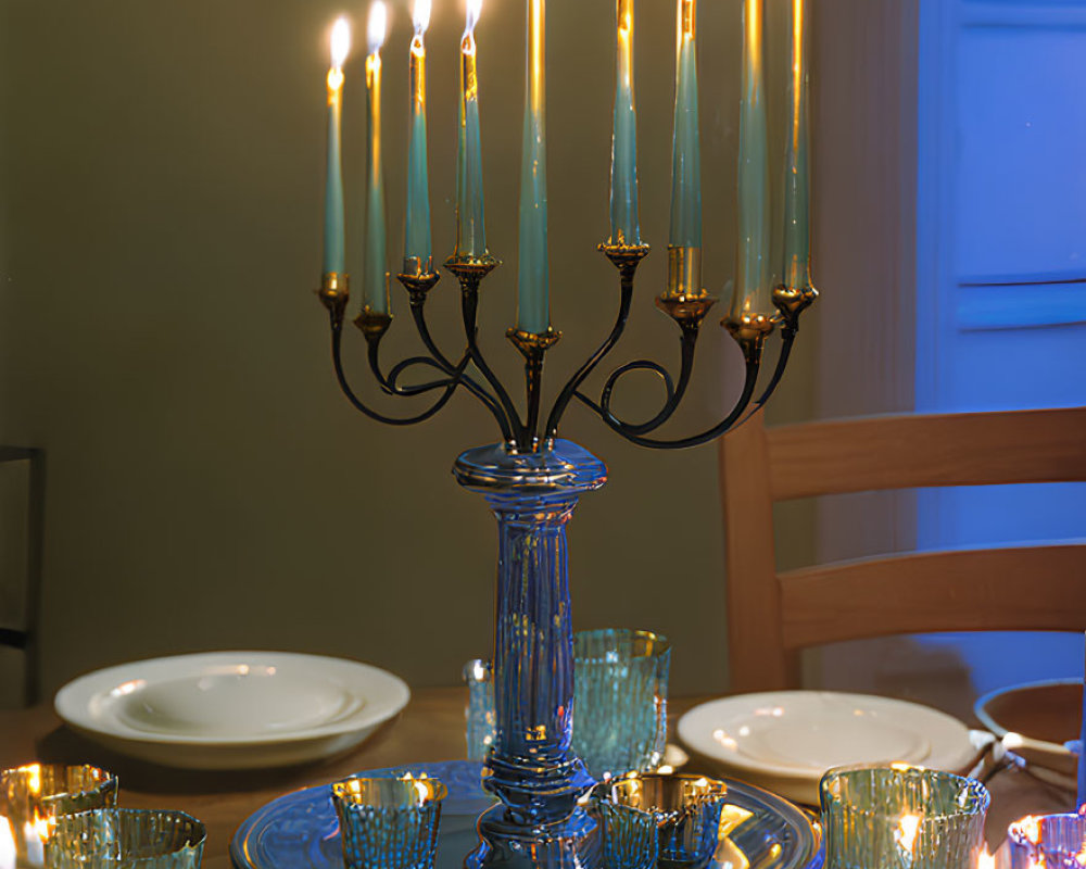 Classically Elegant Blue Candlelit Table Setting with Matching Tableware