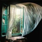 Bright sunlight illuminates blue curtains and purple flowers on window sill