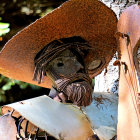 Detailed Bronze Sculpture Resembling Hat and Dress