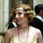 Smiling woman in vintage attire with sequins and headband