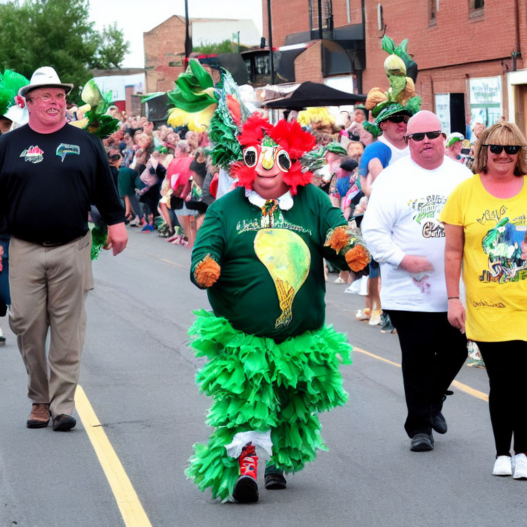 Colorful bird-like costume parade with green feathers and margarita glass.