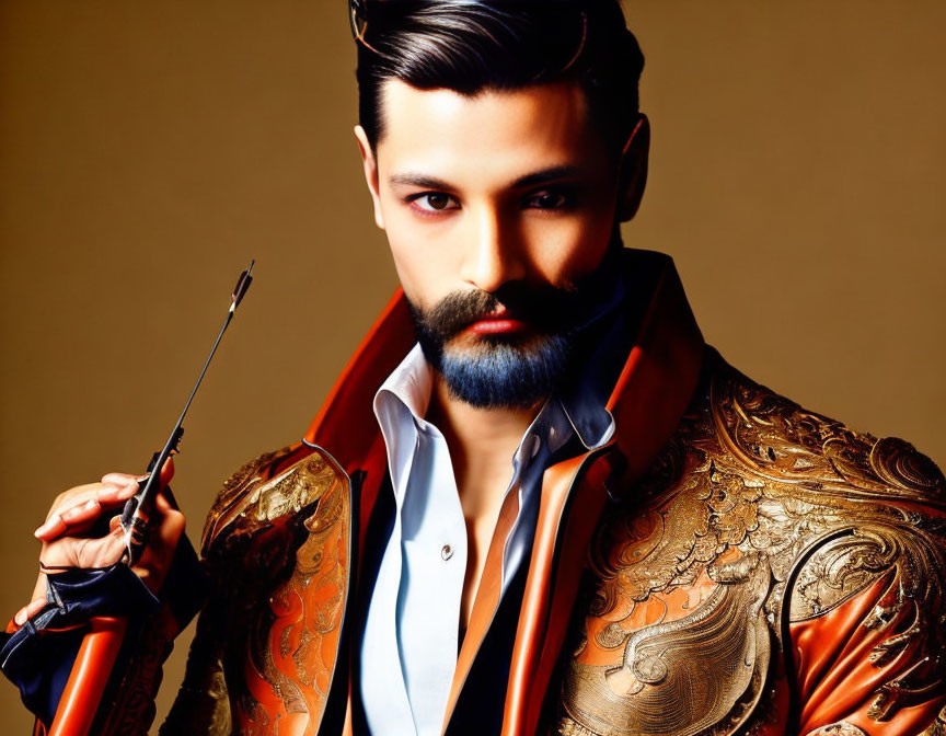 Bearded man in ornate jacket with violin bow