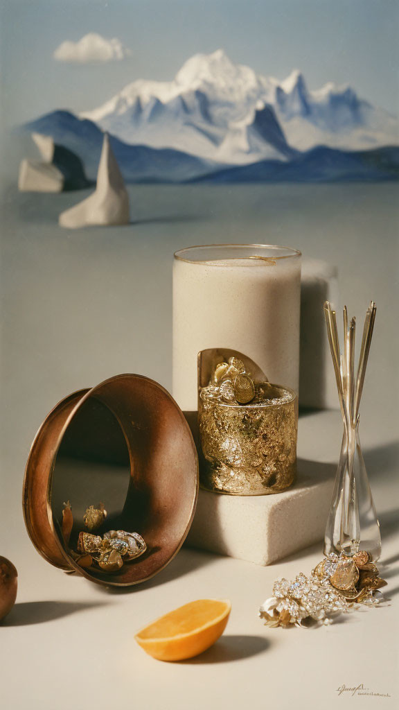 Candles, Orange Slice, Jewelry, and Mountain Background in Still Life