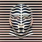 Surreal zebra-striped face mask with red makeup on striped background