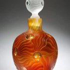 Geometric Amber Perfume Bottle with Translucent Stopper on Gradient Background