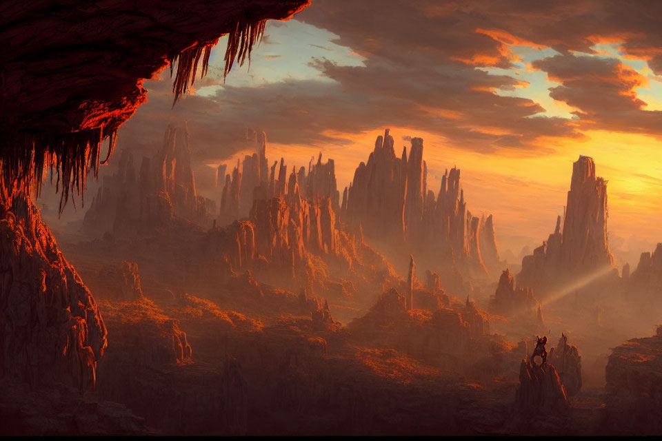 Vibrant sunset over rugged landscape with towering rock formations and stalactites.