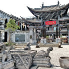 Traditional Chinese Palace with Golden Pagodas and Lush Gardens