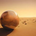 Golden Globe Resting on Sandy Dunes at Sunset in Tranquil Desert