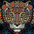 Multicolored ornate tiger's head with jeweled details on dark background