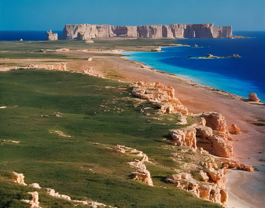 Vivid Coastal Landscape with Blue Waters and Rocky Cliffs