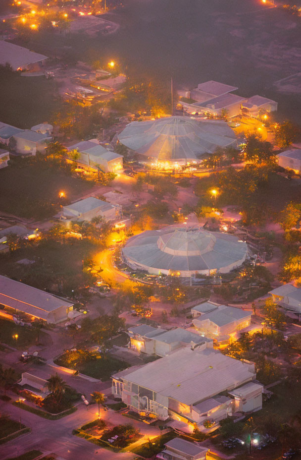 Aerial View of Lit-Up Area with Circular and Rectangular Structures