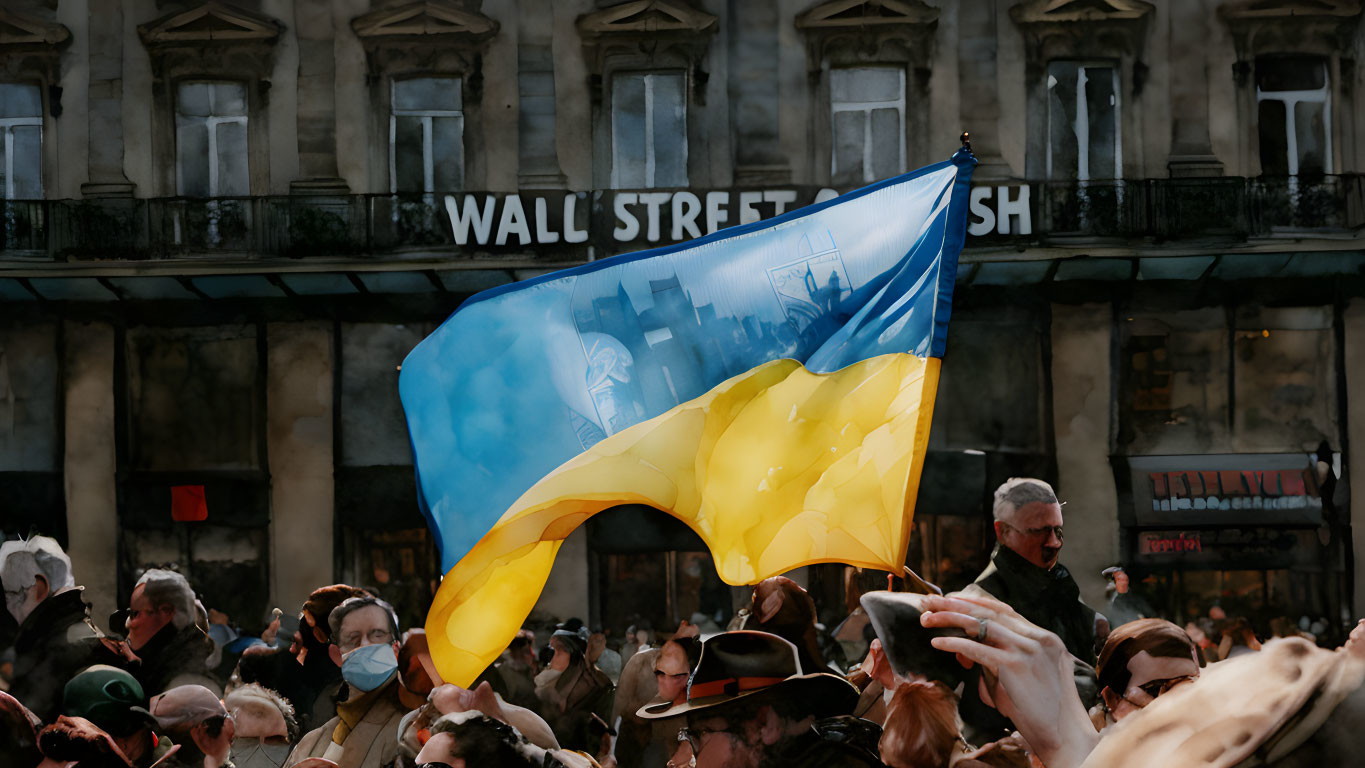 Diverse Crowd with Ukrainian Flag in Urban Setting