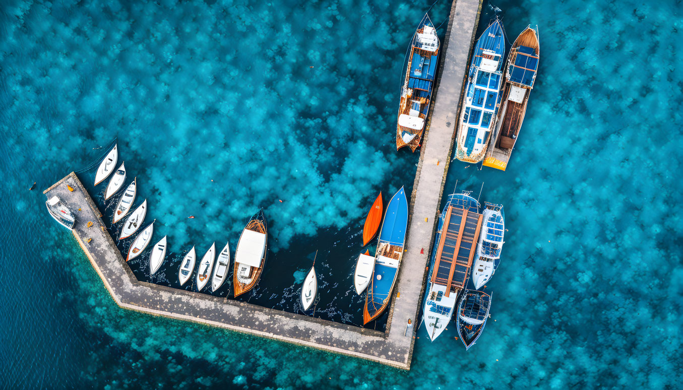 Aerial View of Dock with Boats and Turquoise Water