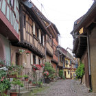 Enchanting cobblestone street with half-timbered houses at twilight