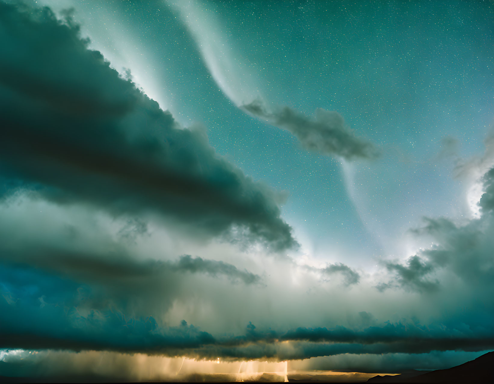 Swirling clouds and star field with sunlight rays in dramatic sky