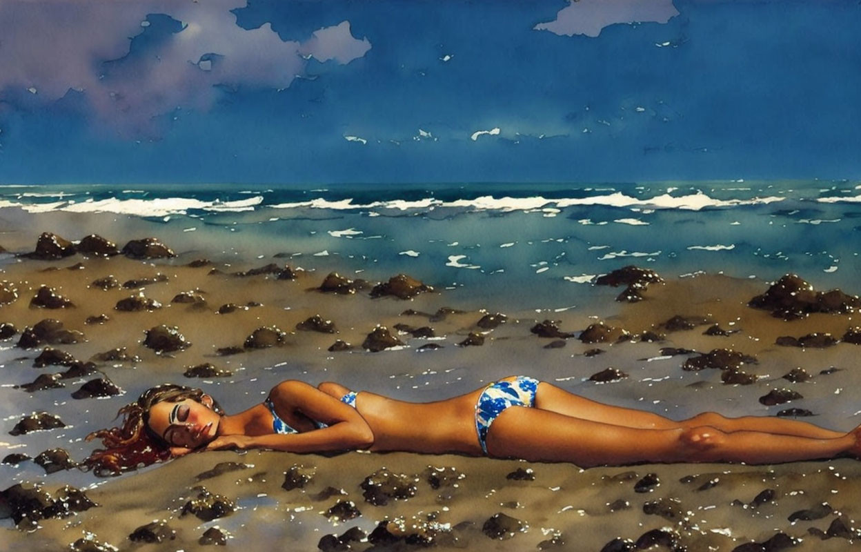 Woman in Blue Bikini Sunbathes on Sandy Beach with Rocky Patches