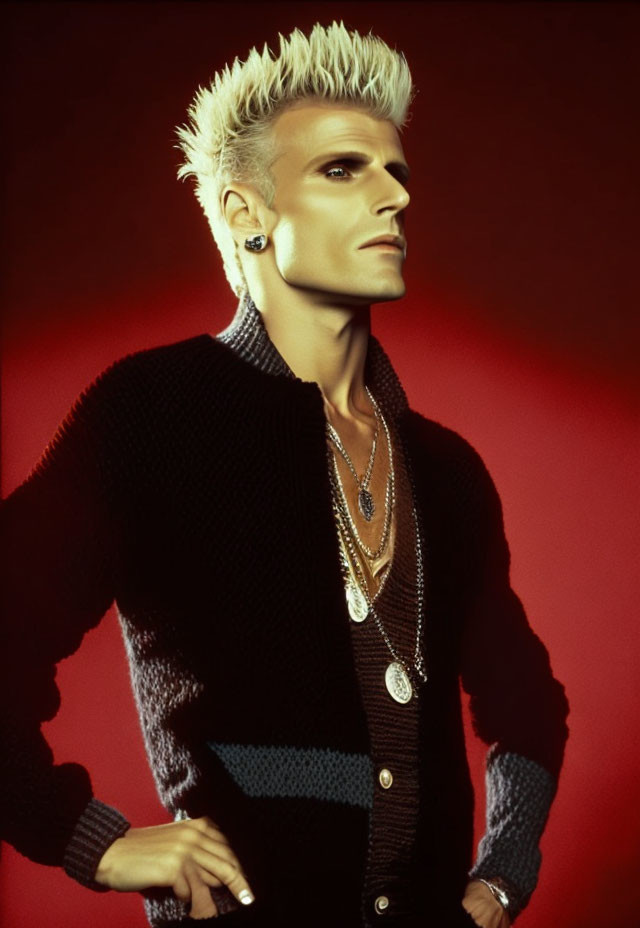 Spiky Bleached Hair, Dark Eye Makeup, Black & Blue Sweater, Multiple Necklaces