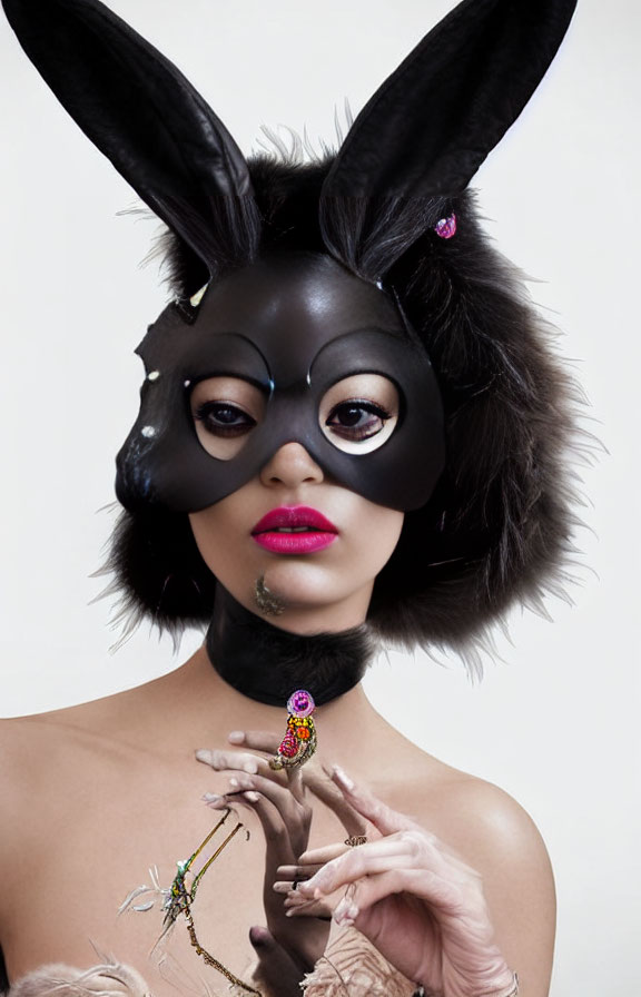 Person in Black Bunny Mask with Pink Lipstick and Accessories