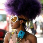 Colorful painting of stylish woman in large purple-accented hat.