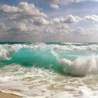 Powerful Ocean Waves Crashing Under Dramatic Sky