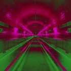 Neon-colored arched corridor with intricate patterns