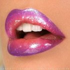 Digitally-generated lips with pink glitter, crystals, and gold detailing