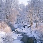 Winter Scene with Glowing Lanterns by Snow-Covered River