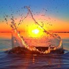 Colorful liquid splash at sunset with orange and blue hues.