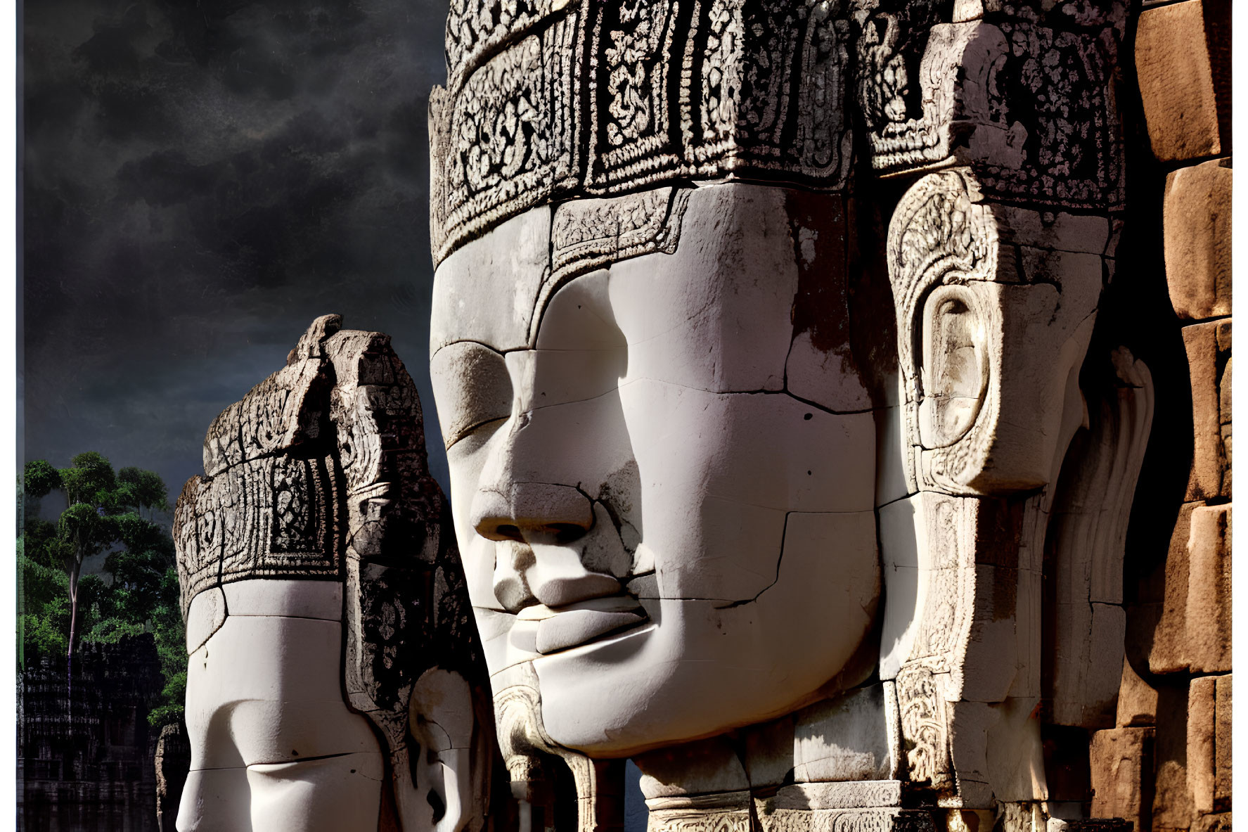 Ancient temple towers adorned with stone faces and intricate carvings