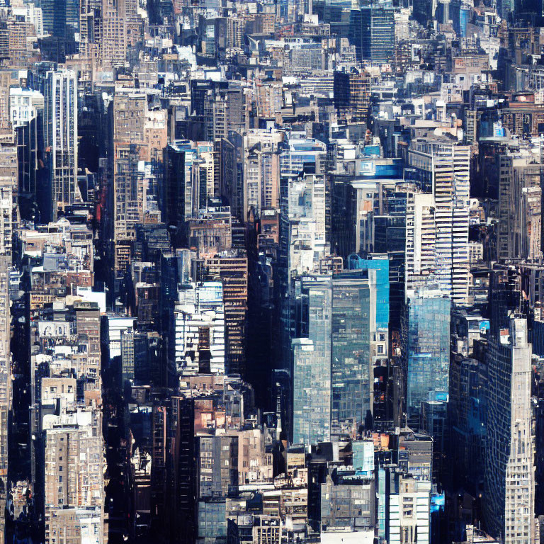 Dense urban skyline with diverse skyscrapers and buildings.