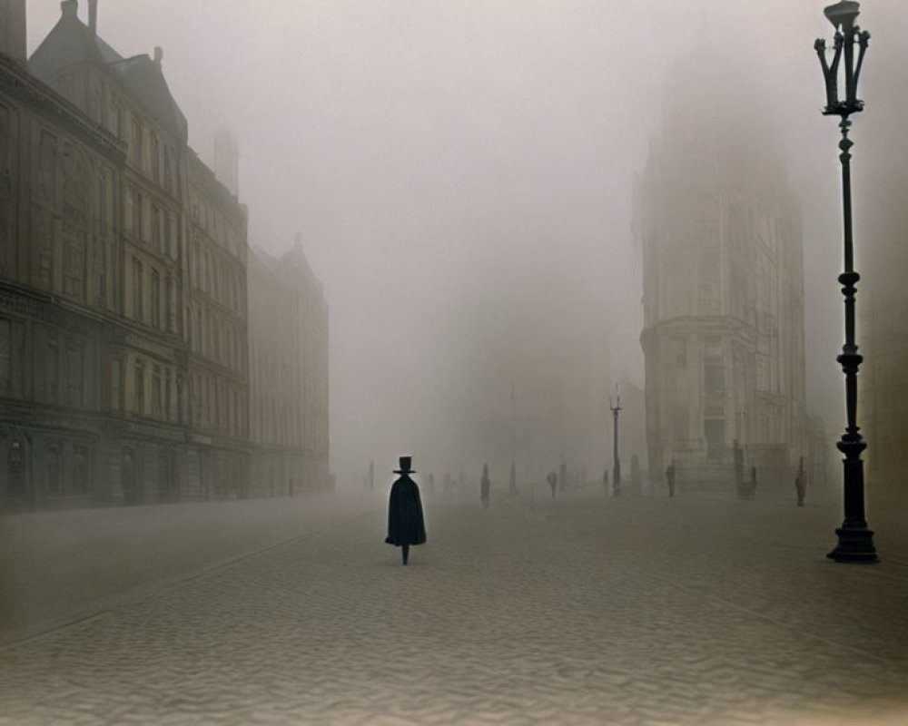 Solitary figure in foggy vintage city street with street lamps and old buildings.