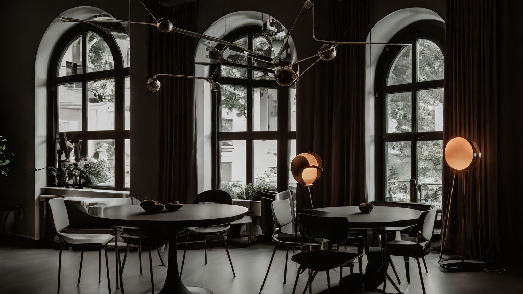 Chic Café Interior with Arched Windows and Minimalistic Furniture