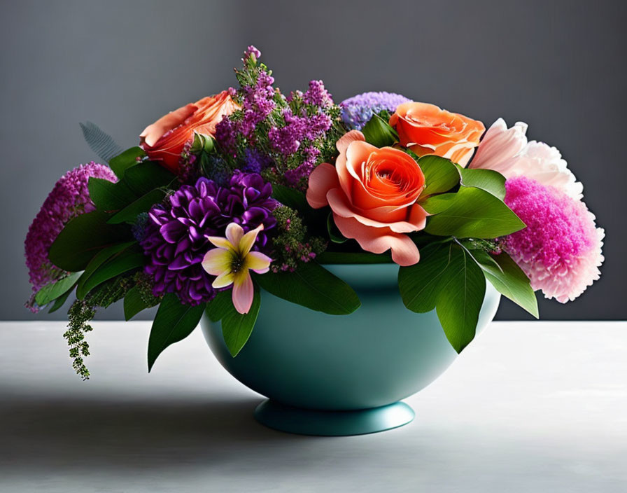 Colorful Floral Arrangement in Teal Bowl on Table