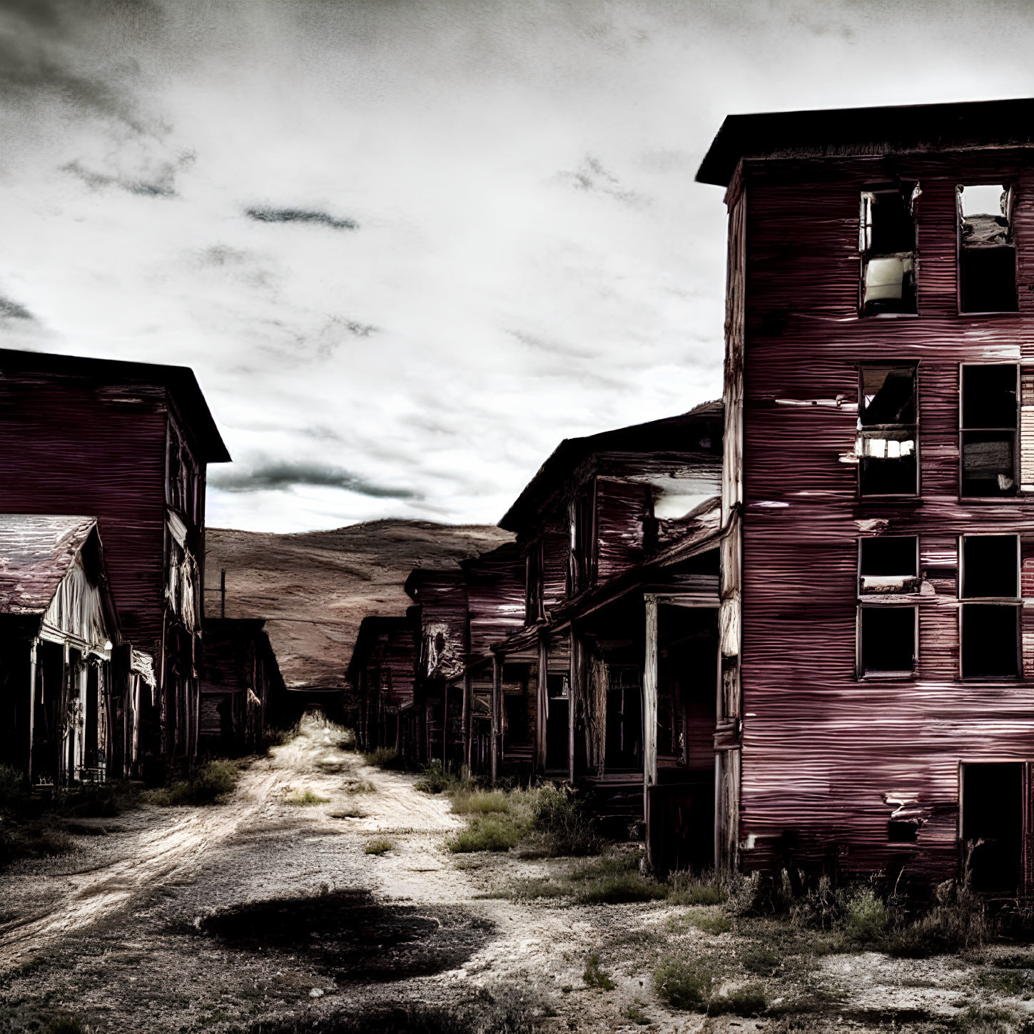 Desolate town with abandoned buildings and broken windows under cloudy sky