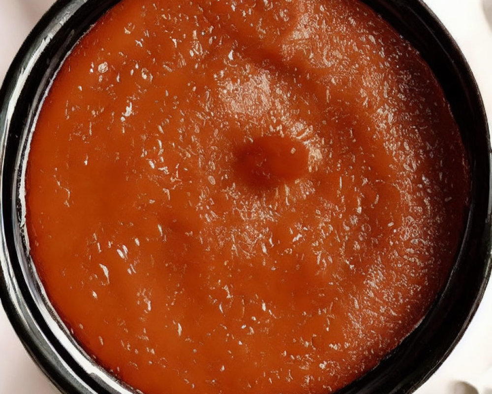 Bright Orange Tomato Soup in Bowl with Creamy Texture