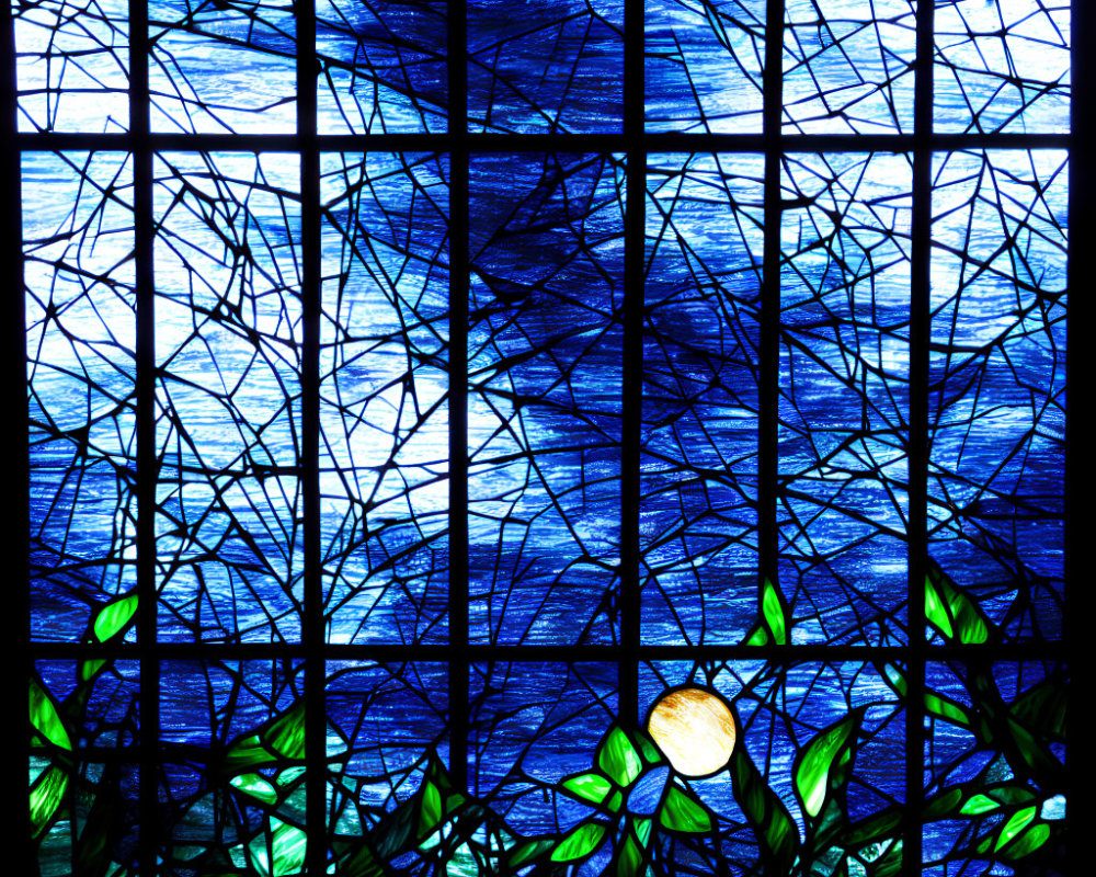 Colorful Stained Glass Window with Blue Patterns and Green Leaf Accents