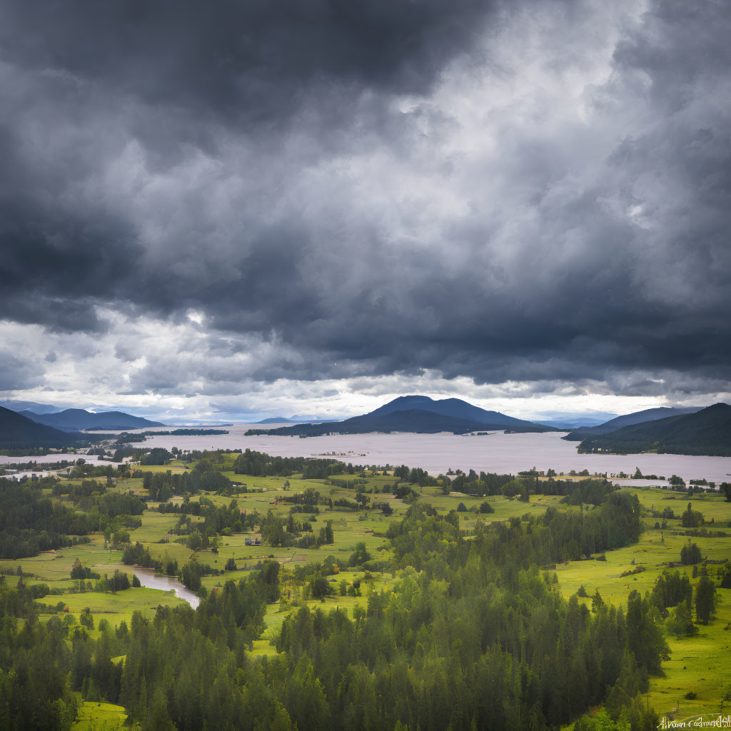 Landscape with Dark Storm Clouds over Green Valley