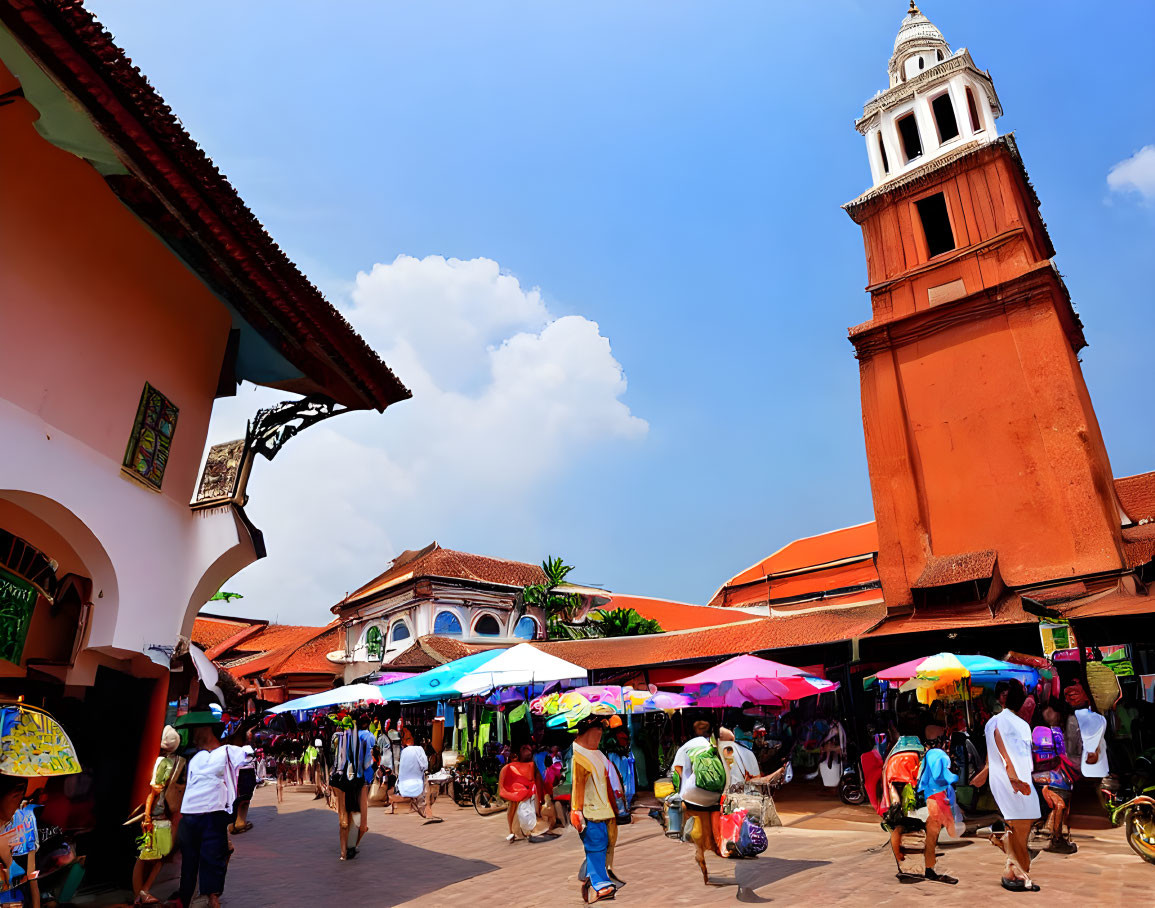 Colorful Outdoor Market with Terracotta Tower and Blue Sky