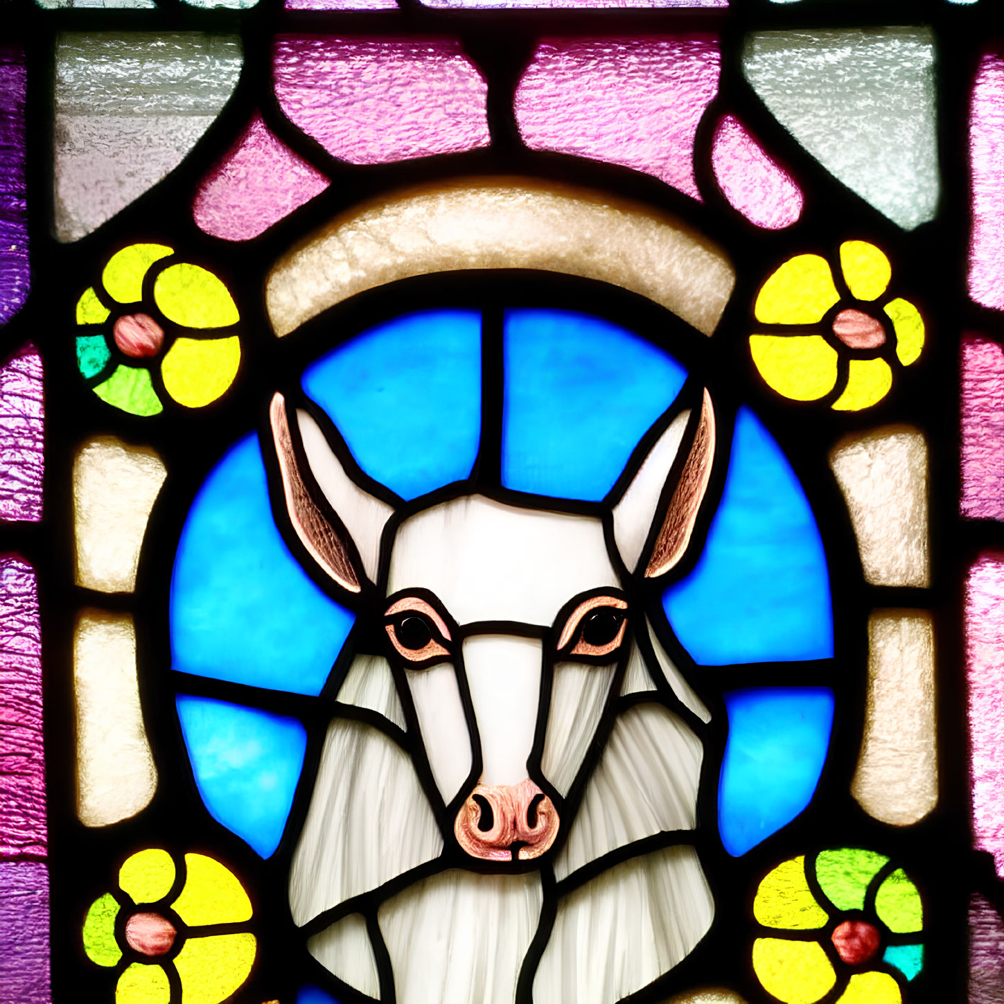 Colorful Stained Glass Window Featuring White Goat's Head